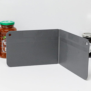 Foldable cutting board that can be hung upright to dry