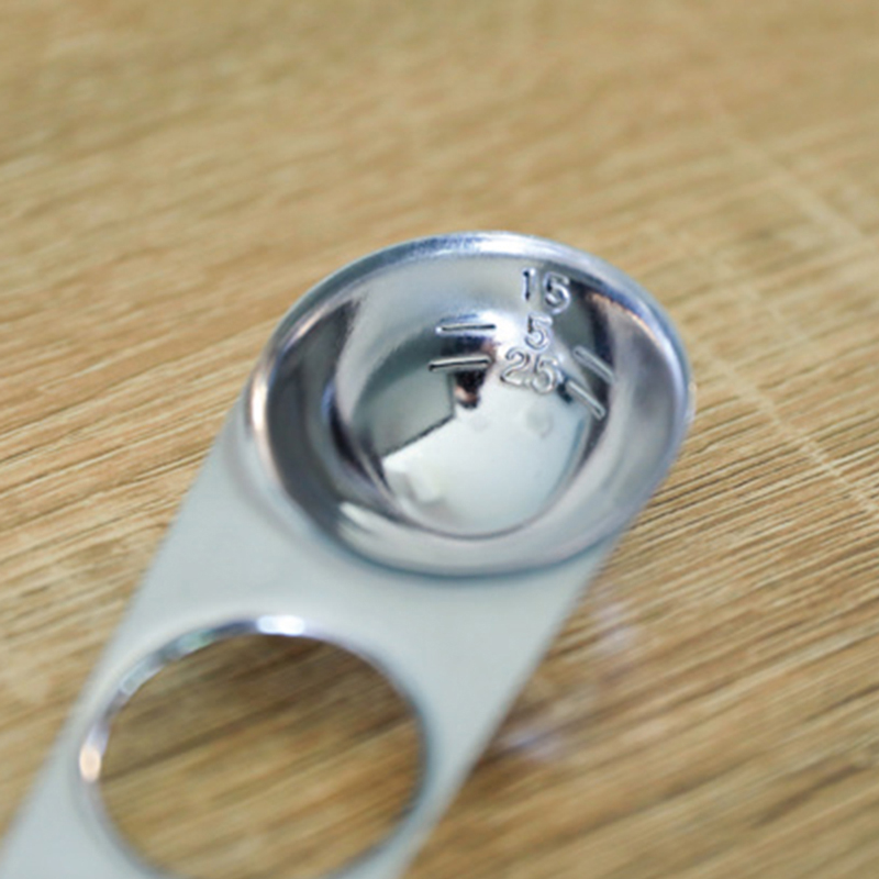 A measuring spoon that can also be used to measure pasta, , large